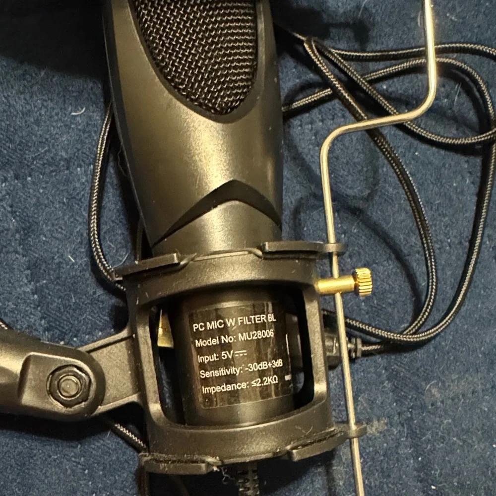 Black microphone with Tripod Stand****FINAL MARKDOWN****